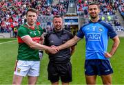2 July 2023; Referee David Gough with team captains Paddy Durcan of Mayo and James McCarthy of Dublin before the GAA Football All-Ireland Senior Championship quarter-final match between Dublin and Mayo at Croke Park in Dublin. Photo by Piaras Ó Mídheach/Sportsfile