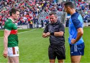 2 July 2023; Referee David Gough with team captains Paddy Durcan of Mayo and James McCarthy of Dublin for the coin toss before the GAA Football All-Ireland Senior Championship quarter-final match between Dublin and Mayo at Croke Park in Dublin. Photo by Piaras Ó Mídheach/Sportsfile
