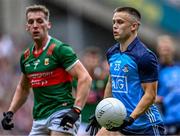 2 July 2023; Eoin Murchan of Dublin in action against Eoghan McLaughlin of Mayo during the GAA Football All-Ireland Senior Championship quarter-final match between Dublin and Mayo at Croke Park in Dublin. Photo by Piaras Ó Mídheach/Sportsfile