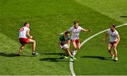 1 July 2023; Paudie Clifford of Kerry in action against Tyrone players, from left, Brian Kennedy, Conor Meyler and Kieran McGeary during the GAA Football All-Ireland Senior Championship quarter-final match between Kerry and Tyrone at Croke Park in Dublin. Photo by Brendan Moran/Sportsfile