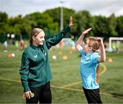 3 July 2023; Republic of Ireland's Izzy Atkinson with Sophia Maher during a visit from Republic of Ireland women's team players to the Hartstown Huntstown FC INTERSPORT Elverys FAI Football Camp in Dublin. Photo by Stephen McCarthy/Sportsfile