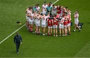 2 July 2023; Cork manager John Cleary walks away as his team huddle before the GAA Football All-Ireland Senior Championship quarter-final match between Derry and Cork at Croke Park in Dublin. Photo by Brendan Moran/Sportsfile