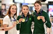 3 July 2023; Gold medalists, from left, Kellie Harrington, Amy Wall and Aoife O'Rourke pictured at Dublin Airport on Team Ireland's return from the European Games 2023 in Krakow, Poland. This evening Team Ireland athletes arrived back in Dublin Airport after a hugely successful European Games, bringing home a haul of 13 medals across boxing, kickboxing, athletics, rugby and taekwondo. The Krakow Games served as an Olympic qualifying event for several sports, with athletes in rugby and boxing securing a spot in next year’s Olympic Games. The number of Team Ireland athletes set to compete in Paris 2024 now sits at 37. Photo by Ramsey Cardy/Sportsfile