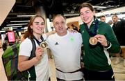 3 July 2023; Boxing head coach Zaur Antia, with gold medalists Kellie Harrington, left, and Aoife O'Rourke pictured at Dublin Airport on Team Ireland's return from the European Games 2023 in Krakow, Poland. This evening Team Ireland athletes arrived back in Dublin Airport after a hugely successful European Games, bringing home a haul of 13 medals across boxing, kickboxing, athletics, rugby and taekwondo. The Krakow Games served as an Olympic qualifying event for several sports, with athletes in rugby and boxing securing a spot in next year’s Olympic Games. The number of Team Ireland athletes set to compete in Paris 2024 now sits at 37. Photo by Ramsey Cardy/Sportsfile
