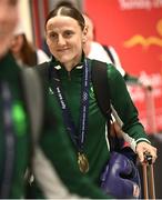 3 July 2023; 57kg boxer Michaela Walsh, with her bronze medal, pictured at Dublin Airport on Team Ireland's return from the European Games 2023 in Krakow, Poland. This evening Team Ireland athletes arrived back in Dublin Airport after a hugely successful European Games, bringing home a haul of 13 medals across boxing, kickboxing, athletics, rugby and taekwondo. The Krakow Games served as an Olympic qualifying event for several sports, with athletes in rugby and boxing securing a spot in next year’s Olympic Games. The number of Team Ireland athletes set to compete in Paris 2024 now sits at 37. Photo by Ramsey Cardy/Sportsfile