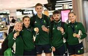 3 July 2023; Kickboxing medalists, from left, Nicola Bannon, Amy Wall, Conor McGinchey, Nathan Tait, Jodie Browne, pictured at Dublin Airport on Team Ireland's return from the European Games 2023 in Krakow, Poland. This evening Team Ireland athletes arrived back in Dublin Airport after a hugely successful European Games, bringing home a haul of 13 medals across boxing, kickboxing, athletics, rugby and taekwondo. The Krakow Games served as an Olympic qualifying event for several sports, with athletes in rugby and boxing securing a spot in next year’s Olympic Games. The number of Team Ireland athletes set to compete in Paris 2024 now sits at 37. Photo by Ramsey Cardy/Sportsfile