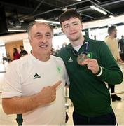3 July 2023; Boxing head coach Zaur Antia with 63.5kg boxing bronze medalist Dean Clancy pictured at Dublin Airport on Team Ireland's return from the European Games 2023 in Krakow, Poland. This evening Team Ireland athletes arrived back in Dublin Airport after a hugely successful European Games, bringing home a haul of 13 medals across boxing, kickboxing, athletics, rugby and taekwondo. The Krakow Games served as an Olympic qualifying event for several sports, with athletes in rugby and boxing securing a spot in next year’s Olympic Games. The number of Team Ireland athletes set to compete in Paris 2024 now sits at 37. Photo by Ramsey Cardy/Sportsfile