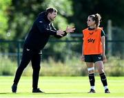 3 July 2023; Assistant manager Tom Elmes and Chloe Mustaki during a Republic of Ireland women training session at the FAI National Training Centre in Abbotstown, Dublin. Photo by Stephen McCarthy/Sportsfile