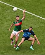 2 July 2023; Pádraig O’Hora of Mayo and Colm Basquel of Dublin compete for a ball during the GAA Football All-Ireland Senior Championship quarter-final match between Dublin and Mayo at Croke Park in Dublin. Photo by Brendan Moran/Sportsfile