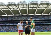 1 July 2023; Referee Brendan Cawley with team captains Pádraig Hampsey of Tyrone and David Clifford of Kerry before the GAA Football All-Ireland Senior Championship quarter-final match between Kerry and Tyrone at Croke Park in Dublin. Photo by Piaras Ó Mídheach/Sportsfile