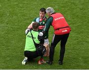2 July 2023; Stephen Coen of Mayo receives medical treatment from team physiotherapist Garrett Coughlan, left, and Dr Sean Moffatt during the GAA Football All-Ireland Senior Championship quarter-final match between Dublin and Mayo at Croke Park in Dublin. Photo by Brendan Moran/Sportsfile