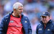 2 July 2023; Cork manager John Cleary, right, and his selector Kevin Walsh leave the pitch after their side's defeat in the GAA Football All-Ireland Senior Championship quarter-final match between Derry and Cork at Croke Park in Dublin. Photo by Piaras Ó Mídheach/Sportsfile
