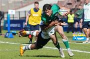 4 July 2023; James Nicholson of Ireland is tackled by Moti Murray of Fiji, left, during the U20 Rugby World Cup match between Fiji and Ireland at Danie Craven Stadium in Stellenbosch, South Africa. Photo by Nic Bothma/Sportsfile