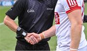 2 July 2023; Referee Joe McQuillan shakes hands with Cork captain Brian Hurley before the GAA Football All-Ireland Senior Championship quarter-final match between Derry and Cork at Croke Park in Dublin. Photo by Piaras Ó Mídheach/Sportsfile