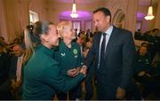 4 July 2023; Republic of Ireland captain Katie McCabe, left, manager Vera Pauw, and An Taoiseach Leo Varadkar TD during a Republic of Ireland FIFA Women's World Cup 2023 send-off event at Farmleigh House in the Phoenix Park, Dublin. Photo by Stephen McCarthy/Sportsfile