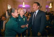 4 July 2023; Republic of Ireland captain Katie McCabe, left, manager Vera Pauw, and An Taoiseach Leo Varadkar TD during a Republic of Ireland FIFA Women's World Cup 2023 send-off event at Farmleigh House in the Phoenix Park, Dublin. Photo by Stephen McCarthy/Sportsfile