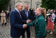 4 July 2023; Tánaiste Micheál Martin TD, left, and Minister of State at Department of Tourism, Culture, Arts, Gaeltacht, Sport and Media Thomas Byrne TD, greet Amber Barrett during a Republic of Ireland FIFA Women's World Cup 2023 send-off event at Farmleigh House in the Phoenix Park, Dublin. Photo by Stephen McCarthy/Sportsfile