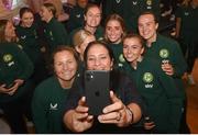 4 July 2023; Minister for Tourism, Culture, Arts, Gaeltacht, Sport and Media, Catherine Martin TD, takes a selfie with Republic of Ireland players during a Republic of Ireland FIFA Women's World Cup 2023 send-off event at Farmleigh House in the Phoenix Park, Dublin. Photo by Stephen McCarthy/Sportsfile