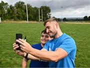 5 July 2023; Leinster player Jordan Larmour takes a selfie during a Bank of Ireland Leinster Rugby Summer Camp at Stillorgan-Rathfarnham RFC in Dublin. Photo by Harry Murphy/Sportsfile