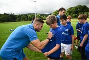 5 July 2023; Leinster player Jordan Larmour signs autographs during a Bank of Ireland Leinster Rugby Summer Camp at Stillorgan-Rathfarnham RFC in Dublin. Photo by Harry Murphy/Sportsfile