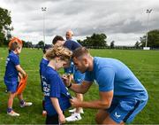 5 July 2023; Leinster player Jordan Larmour signs autographs during a Bank of Ireland Leinster Rugby Summer Camp at Stillorgan-Rathfarnham RFC in Dublin. Photo by Harry Murphy/Sportsfile