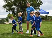 5 July 2023; Leinster player Jordan Larmour  with attendees during a Bank of Ireland Leinster Rugby Summer Camp at Stillorgan-Rathfarnham RFC in Dublin. Photo by Harry Murphy/Sportsfile