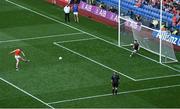 1 July 2023; Rian O'Neill of Armagh scores his side's first penalty past Monaghan goalkeeper Rory Beggan in the penalty shoot out during the GAA Football All-Ireland Senior Championship quarter-final match between Armagh and Monaghan at Croke Park in Dublin Photo by Brendan Moran/Sportsfile
