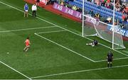 1 July 2023; Rory Grugan of Armagh scores his side's fifth penalty past Monaghan goalkeeper Rory Beggan in the penalty shoot out during the GAA Football All-Ireland Senior Championship quarter-final match between Armagh and Monaghan at Croke Park in Dublin Photo by Brendan Moran/Sportsfile