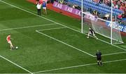 1 July 2023; Rian O'Neill of Armagh scores his side's sixth penalty past Monaghan goalkeeper Rory Beggan in the penalty shoot out during the GAA Football All-Ireland Senior Championship quarter-final match between Armagh and Monaghan at Croke Park in Dublin Photo by Brendan Moran/Sportsfile