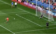 1 July 2023; Rory Grugan of Armagh scores his side's fifth penalty past Monaghan goalkeeper Rory Beggan in the penalty shoot out during the GAA Football All-Ireland Senior Championship quarter-final match between Armagh and Monaghan at Croke Park in Dublin Photo by Brendan Moran/Sportsfile