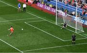 1 July 2023; Rory Grugan of Armagh scores his side's fifth penalty past Monaghan goalkeeper Rory Beggan in the penalty shoot out during the GAA Football All-Ireland Senior Championship quarter-final match between Armagh and Monaghan at Croke Park in Dublin Photo by Brendan Moran/Sportsfile