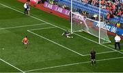 1 July 2023; Shane McPartlan of Armagh scores his side's seventh penalty past Monaghan goalkeeper Rory Beggan in the penalty shoot out during the GAA Football All-Ireland Senior Championship quarter-final match between Armagh and Monaghan at Croke Park in Dublin Photo by Brendan Moran/Sportsfile