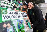 6 July 2023; Jamie Finn of Republic of Ireland with supporter Isabelle Byrne, aged nine, before the women's international friendly match between Republic of Ireland and France at Tallaght Stadium in Dublin. Photo by Stephen McCarthy/Sportsfile