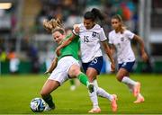 6 July 2023; Kyra Carusa of Republic of Ireland is tackled by Kenza Dali of France during the women's international friendly match between Republic of Ireland and France at Tallaght Stadium in Dublin. Photo by Stephen McCarthy/Sportsfile