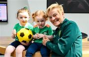 7 July 2023; Manager Vera Pauw with supporters Doireann Mulvaney, age 3, left, and Isla Reilly, age 2, at Dublin Airport ahead of the Republic of Ireland's flight to Australia for the FIFA Women's World Cup 2023. Photo by Stephen McCarthy/Sportsfile