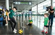 7 July 2023; Denise O'Sullivan with supporters Doireann Mulvaney, age 3, right, and Joshua McQueen, age 8, at Dublin Airport ahead of the Republic of Ireland's flight to Australia for the FIFA Women's World Cup 2023. Photo by Stephen McCarthy/Sportsfile