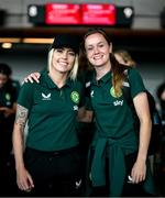 7 July 2023; Denise O'Sullivan, left, and Heather Payne at Dublin Airport ahead of the Republic of Ireland's flight to Australia for the FIFA Women's World Cup 2023. Photo by Stephen McCarthy/Sportsfile