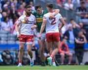 1 July 2023; David Clifford of Kerry shares a joke with Tyrone players Pádraig Hampsey, left, and Michael McKernan during the GAA Football All-Ireland Senior Championship quarter-final match between Kerry and Tyrone at Croke Park in Dublin. Photo by Piaras Ó Mídheach/Sportsfile