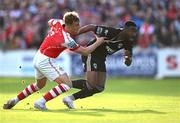 7 July 2023; Babatunde Owolabi of Cork City and Sam Curtis of St Patrick's Athletic tussle as they race for the ball during the SSE Airtricity Men's Premier Division match between St Patrick's Athletic and Cork City at Richmond Park in Dublin. Photo by Piaras Ó Mídheach/Sportsfile