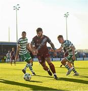 7 July 2023; Gary Deegan of Drogheda United in action against Graham Burke, left, and Rory Gaffney of Shamrock Rovers during the SSE Airtricity Men's Premier Division match between Drogheda United and Shamrock Rovers at Weaver's Park in Drogheda, Louth. Photo by Ramsey Cardy/Sportsfile