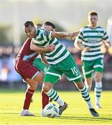 7 July 2023; Graham Burke of Shamrock Rovers in action against Luke Heeney of Drogheda United during the SSE Airtricity Men's Premier Division match between Drogheda United and Shamrock Rovers at Weaver's Park in Drogheda, Louth. Photo by Ramsey Cardy/Sportsfile