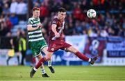7 July 2023; Evan Weir of Drogheda United in action against Rory Gaffney of Shamrock Rovers during the SSE Airtricity Men's Premier Division match between Drogheda United and Shamrock Rovers at Weaver's Park in Drogheda, Louth. Photo by Ramsey Cardy/Sportsfile