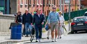 8 July 2023; RTÉ GAA correspondent, reporter and commentator Marty Morrissey and statistician Dave Punch, right, walk along Jones' Road on their way to the GAA Hurling All-Ireland Senior Championship semi-final match between Limerick and Galway at Croke Park in Dublin. Photo by Ray McManus/Sportsfile