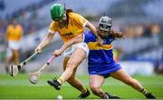 8 July 2023; Grace O'Brien of Tipperary is tackled by Colleen Patterson of Antrim during the All-Ireland Senior Camogie Championship quarter-final match between Tipperary and Antrim at Croke Park in Dublin. Photo by John Sheridan/Sportsfile