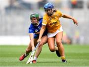 8 July 2023; Róisín Howard of Tipperary in action against Katie Laverty of Antrim during the All-Ireland Senior Camogie Championship quarter-final match between Tipperary and Antrim at Croke Park in Dublin. Photo by Stephen Marken/Sportsfile