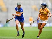 8 July 2023; Cait Devane of Tipperary in action against Katie Laverty of Antrim during the All-Ireland Senior Camogie Championship quarter-final match between Tipperary and Antrim at Croke Park in Dublin. Photo by Stephen Marken/Sportsfile