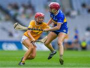8 July 2023; Caitrin Dobbin of Antrim in action against Teresa Ryan of Tipperary during the All-Ireland Senior Camogie Championship quarter-final match between Tipperary and Antrim at Croke Park in Dublin. Photo by John Sheridan/Sportsfile