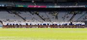 8 July 2023; The Antrim and Tipperary teams stand together wearing United for Equality t-shirts before the All-Ireland Senior Camogie Championship quarter-final match between Tipperary and Antrim at Croke Park in Dublin. Photo by John Sheridan/Sportsfile