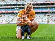 8 July 2023; Chloe Drain of Antrim with her son Cillian McShane age 11 months after the All-Ireland Senior Camogie Championship quarter-final match between Tipperary and Antrim at Croke Park in Dublin. Photo by Stephen Marken/Sportsfile