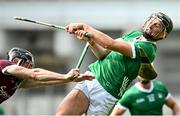 8 July 2023; Pádraic Mannion of Galway breaks his hurl whilst tackling Gearóid Hegarty of Limerick during the GAA Hurling All-Ireland Senior Championship semi-final match between Limerick and Galway at Croke Park in Dublin. Photo by Ramsey Cardy/Sportsfile